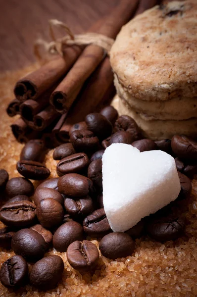 Cofee beans and brown sugar — Stock Photo, Image