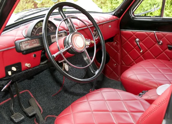 Antique car with red interior inside — Stock Photo, Image