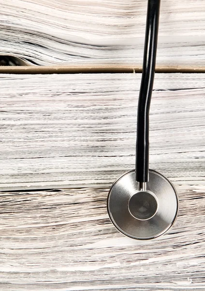 Stethoscope is lying on papers — Stock Photo, Image