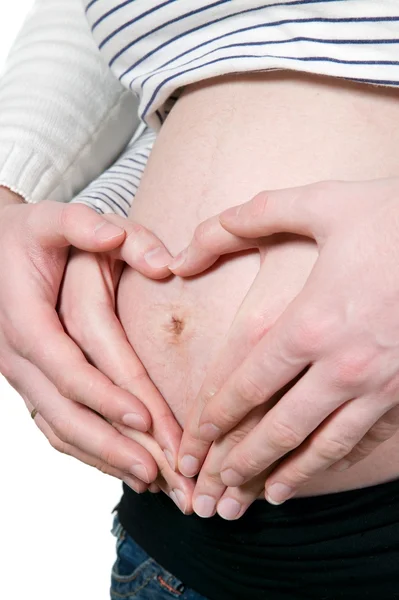 Heart made on pregnant woman belly — Stock Photo, Image