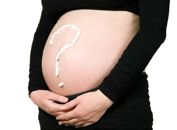 Vraagteken op zwangere buik — Stockfoto