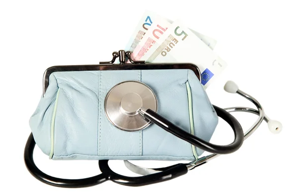 Stethoscope is lying on purse — Stock Photo, Image