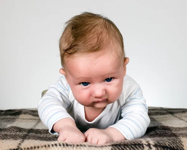 Baby boy looks like angry and strong — Stock Photo, Image