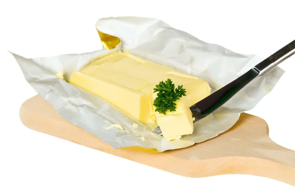 Żółty masła z papieru — Zdjęcie stockowe