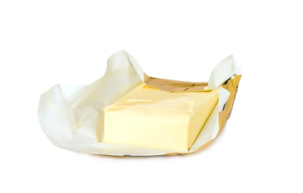 Mantequilla amarilla con paquete de papel Imagen De Stock
