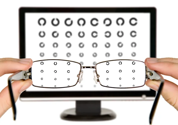 Man is viewing to eye examination chart — Stock Photo, Image