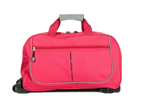 Pink luggage with wheels — Stock Photo, Image