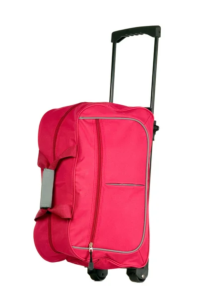 Różowy bagażu z koła — Zdjęcie stockowe