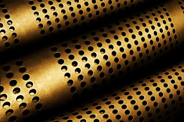 Tubi metallici perforati — Foto Stock