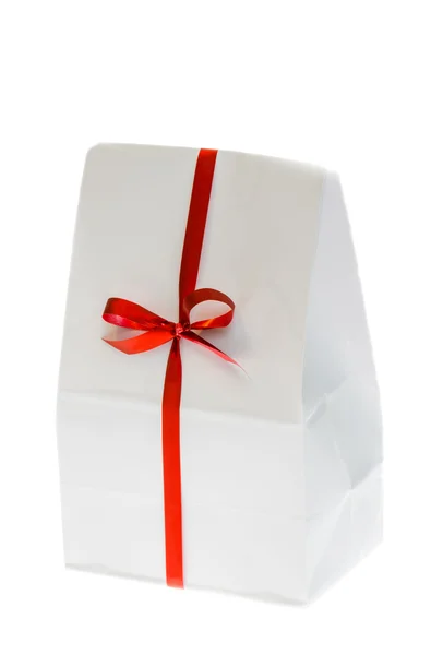 White box with red bow. — Stock Photo, Image