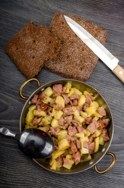 Fried potato with meat — Stock Photo, Image