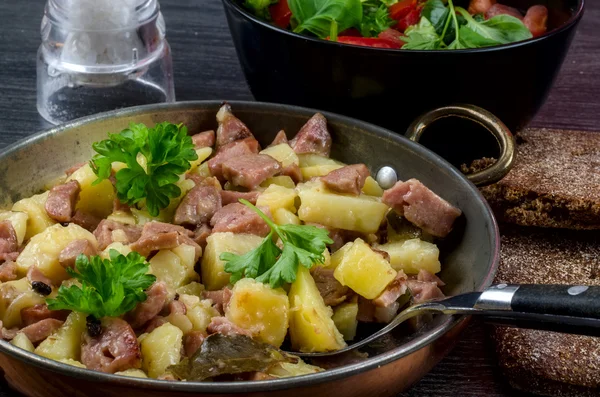 Fried potato with meat — Stock Photo, Image