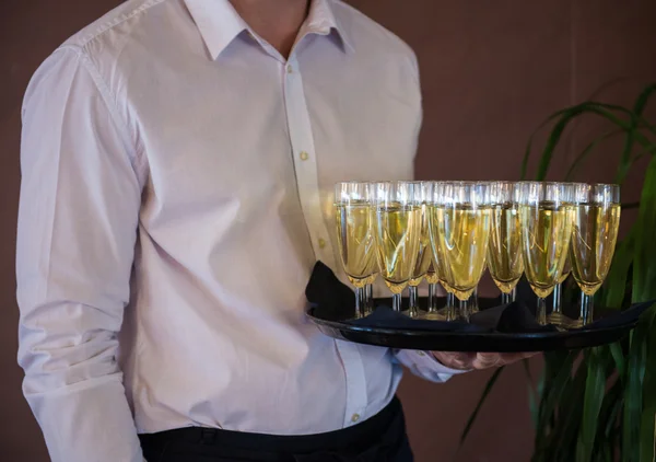 Waiter with champagne — Stock Photo, Image
