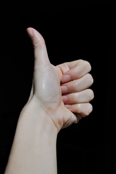 Hand with thumb up on black background — Stock Photo, Image