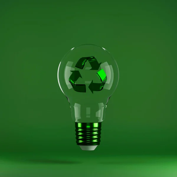 Recycling sign inside light bulb on green background. Concept of energy saving, eco-friendly technologies and sustainable lifestyle.