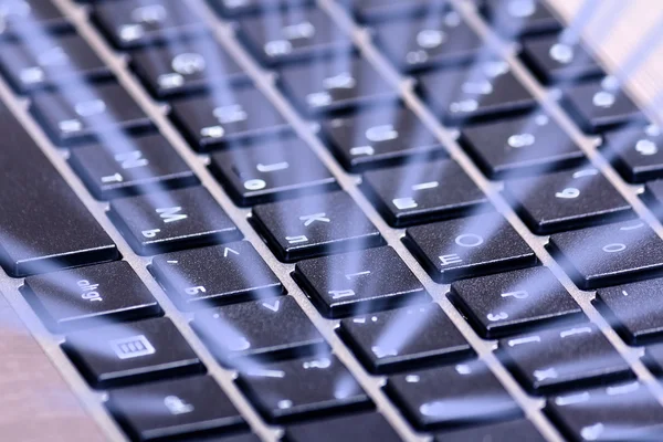 Laptop keyboard with blue backlight — Stock Photo, Image