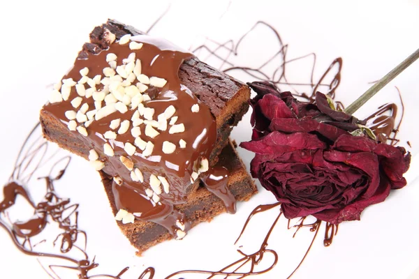 Brownie versierd met een roos — Stockfoto