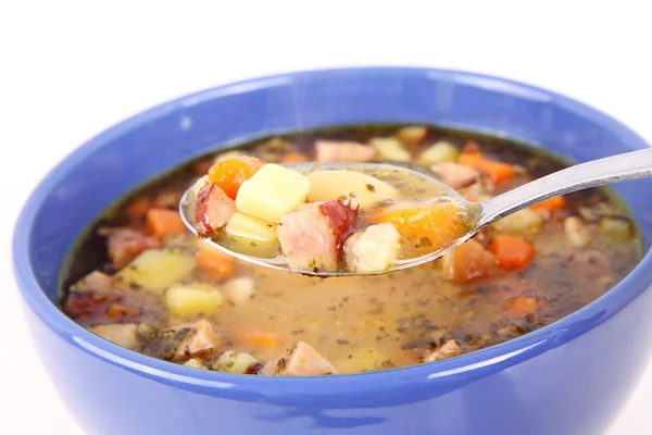 Bean soup eaten with a spoon — Stock Photo, Image