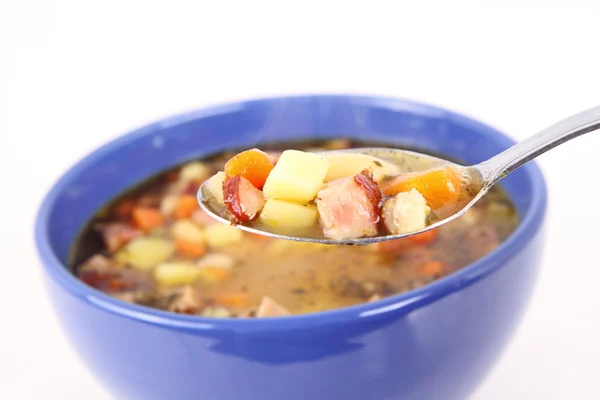 Sopa de feijão comida com uma colher — Fotografia de Stock