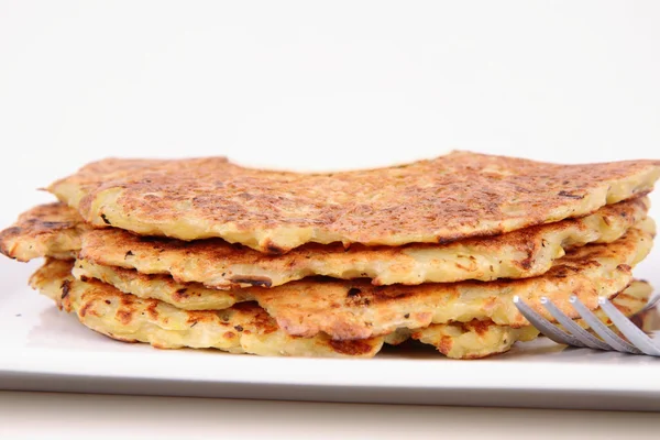 Potato pan cakes with cream — Stock Photo, Image