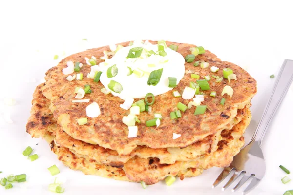 Potato pan cakes with cream — Stock Photo, Image