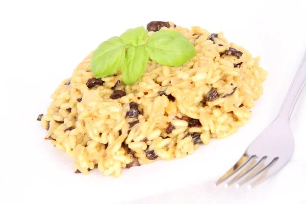 Risotto com cogumelos em uma chapa — Fotografia de Stock