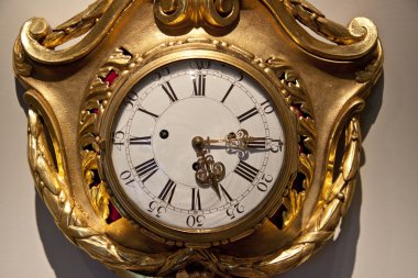 Old golden clock clipart