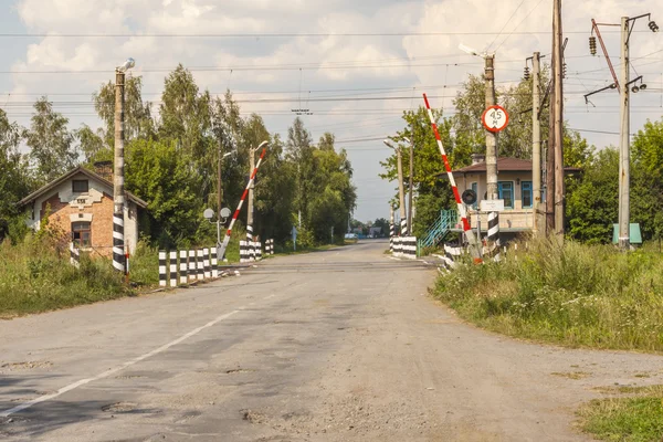 Railway track crossing rural route - Ukraine. — Stock Photo, Image