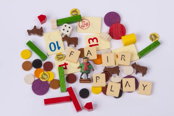 Fair play word and games elements on white background. — Stock Photo, Image