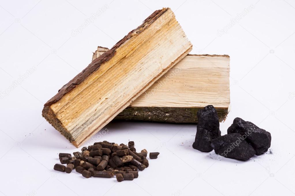 Timber, coal and biomass pellet on white background.