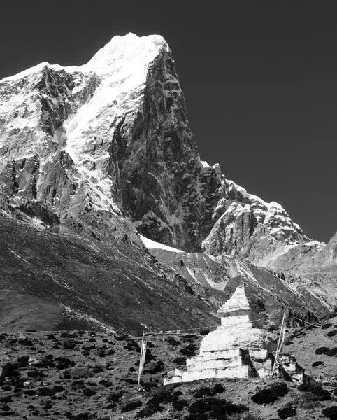 black and white view of Tabuche Peak and stupa on the way to Everest base camp