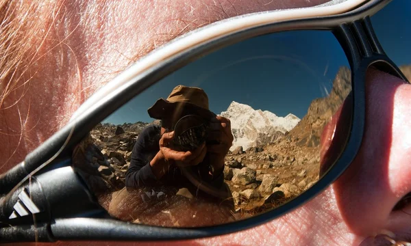 Fotograf rereflecting på glasögon — Stockfoto