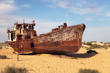 Boats in desert around Moynaq, Muynak or Moynoq - Aral sea or Aral lake - Uzbekistan - asia clipart
