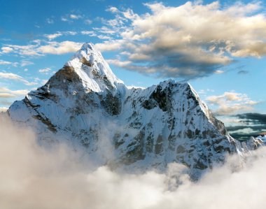 Beautiful view of Ama Dablam with and beautiful clouds - Sagarmatha national park - Khumbu valley - Trek to Everest base cam - Nepal clipart