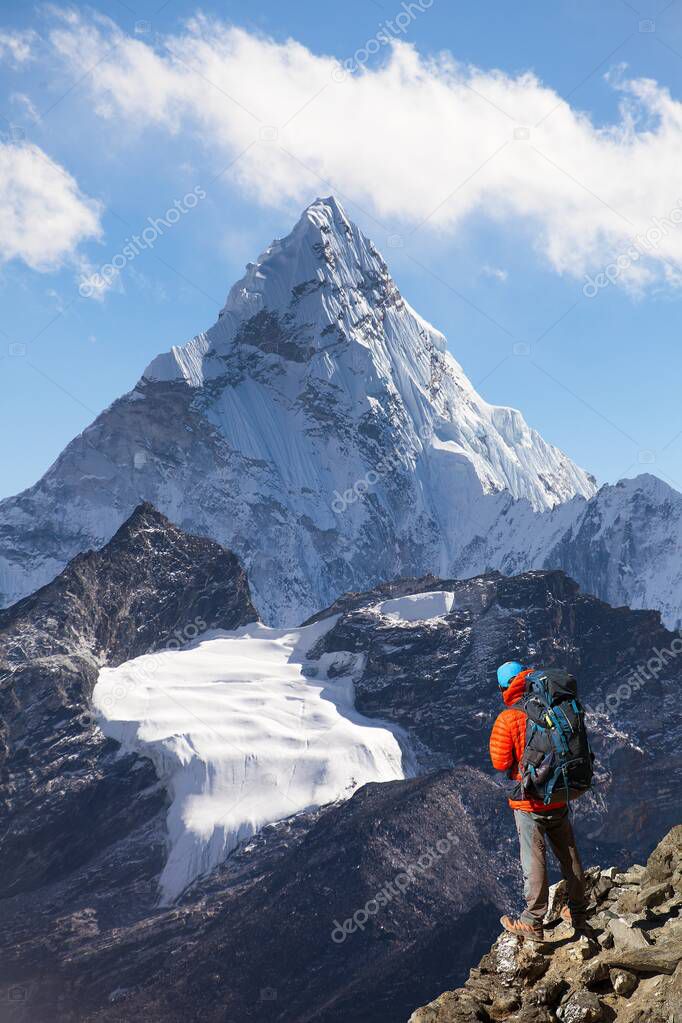 Panoramic view of Mount Ama Dablam with tourist and glacier on the way to Everest base camp, Sagarmatha national park, Khumbu valley Solukhumbu - Nepal Himalayas mountains