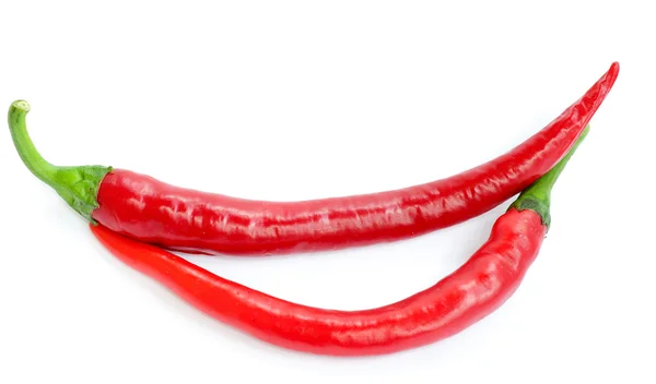 Dvě červené chilli papričky — Stock fotografie