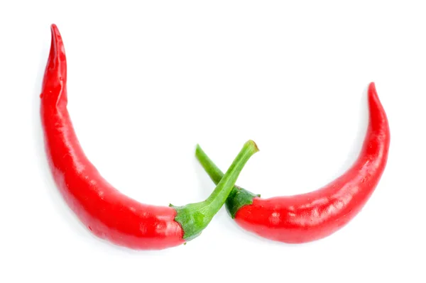 Två röd chili peppers — Stockfoto