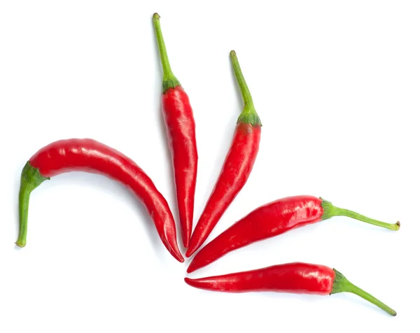 Vijf rode chilipepers — Stockfoto