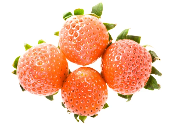 Four Half-ripe Strawberries with leaves — Stock Photo, Image