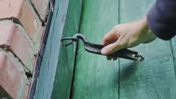 Close Caucasian Mans Hand Closes Wooden Door House Locked Hook — Stock Video