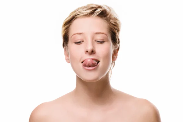 Cute woman trying to reach her nose with her tongue Stock Image