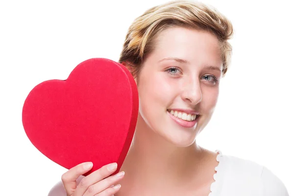 Happy woman with a red heart — Stock Photo, Image