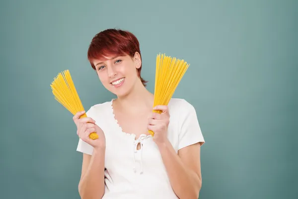 Woman holding spaghetti Stock Image
