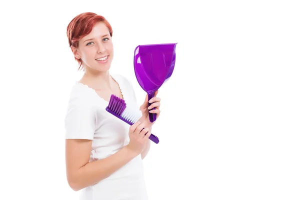 Mujer feliz con cepillo y pala —  Fotos de Stock