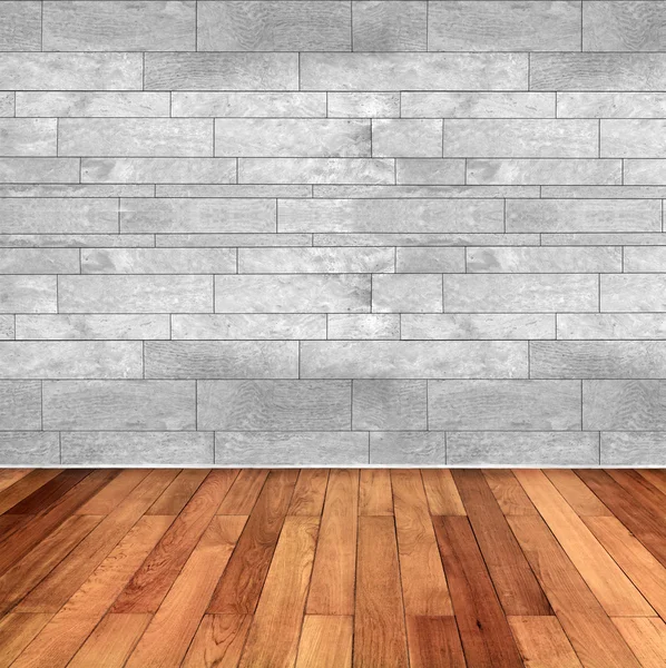 Quarto vazio com piso de madeira e parede de mármore branco — Fotografia de Stock