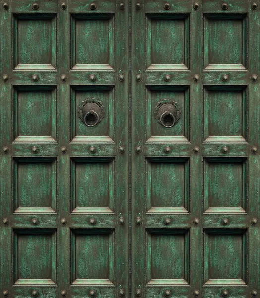 Зеленая гранжевая деревянная дверь — стоковое фото