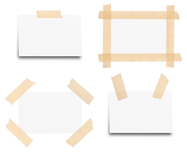 Cinta adhesiva en papel de nota aislado sobre fondo blanco —  Fotos de Stock