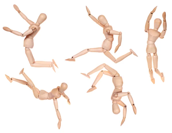 Coleção de boneco de madeira figura humana em ação de salto — Fotografia de Stock