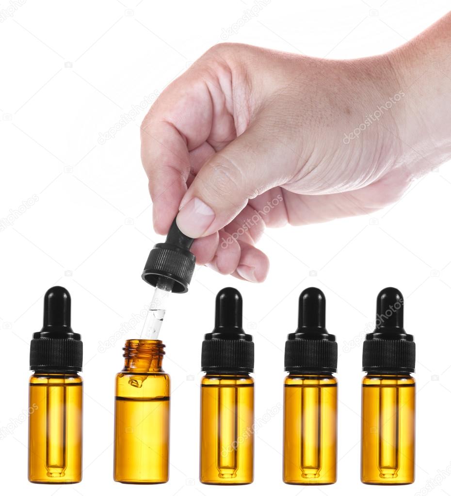 Medical glass dropper on white background