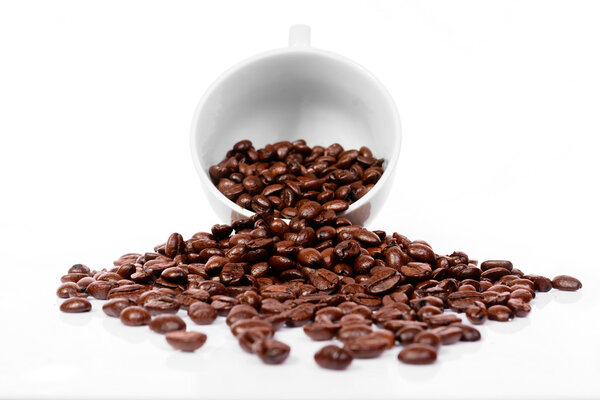 Cup with brown coffee bean